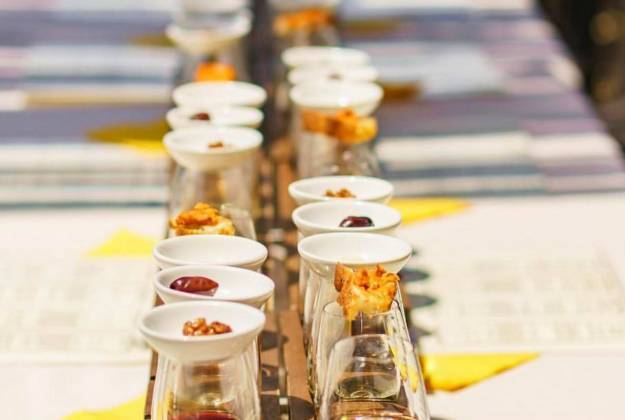 Table set with wine glasses and food pairings, Castia Miro, Waiheke Island